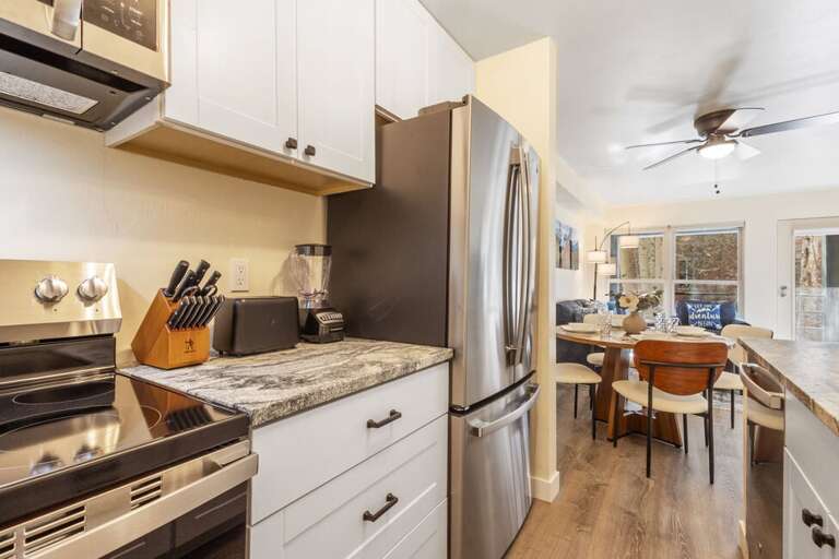 Updated Kitchen with new stainless steel appliances: Electric oven, Microwave, French Door Refrigerator, dishwasher.