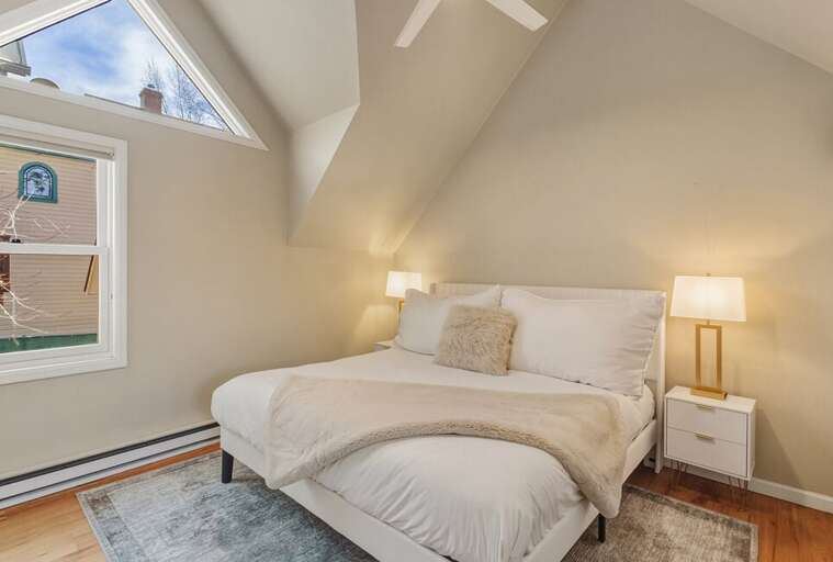 Spacious Primary bedroom with King bed, ensuite bathroom.and stunning natural light.