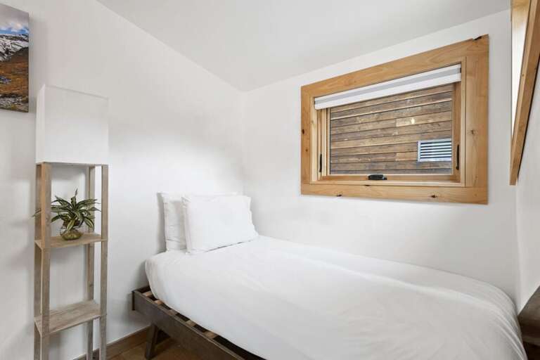 Additional single bed for extra guests or can be used as a place to read.