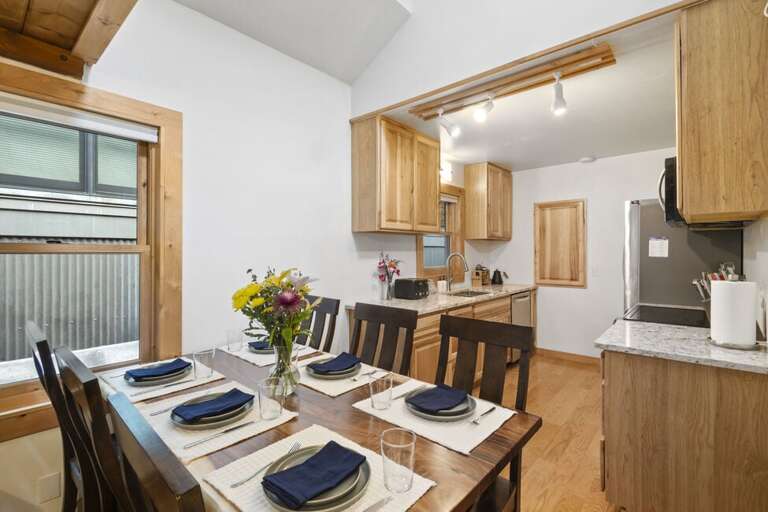 Cozy galley Kitchen and dining for 6.