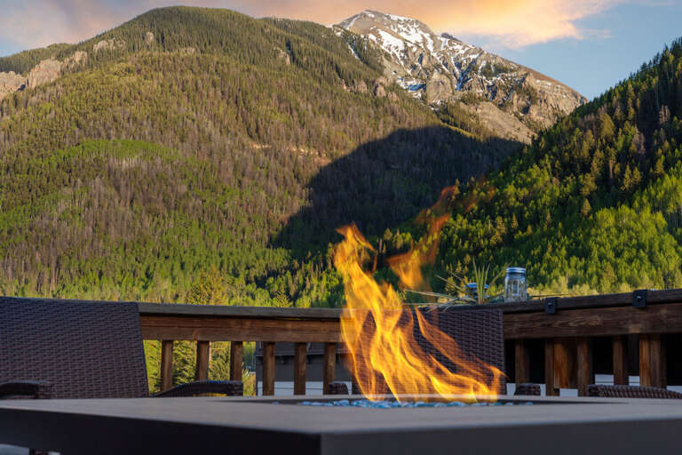 Enjoy evening fires while looking out at bear creek and the Telluride Valley.
