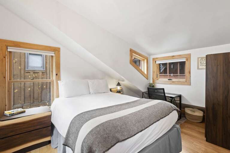 Guest room with Queen bed and office desk