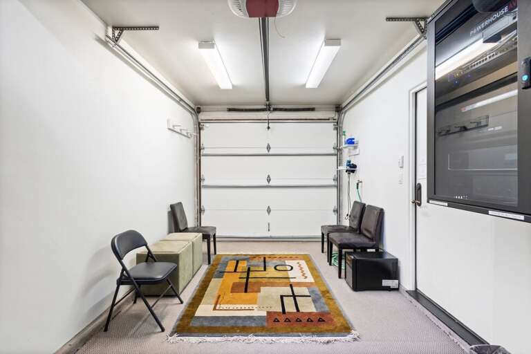 Garage space for storing your ski gear, complete with a mini fridge to enjoy a cold drink while wrapping up your mountain adventures!