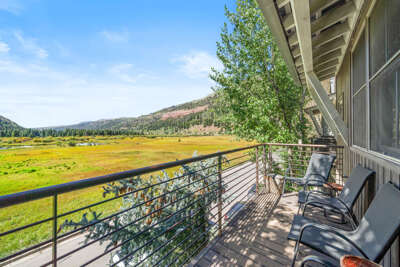 Valley views from private deck off living area.