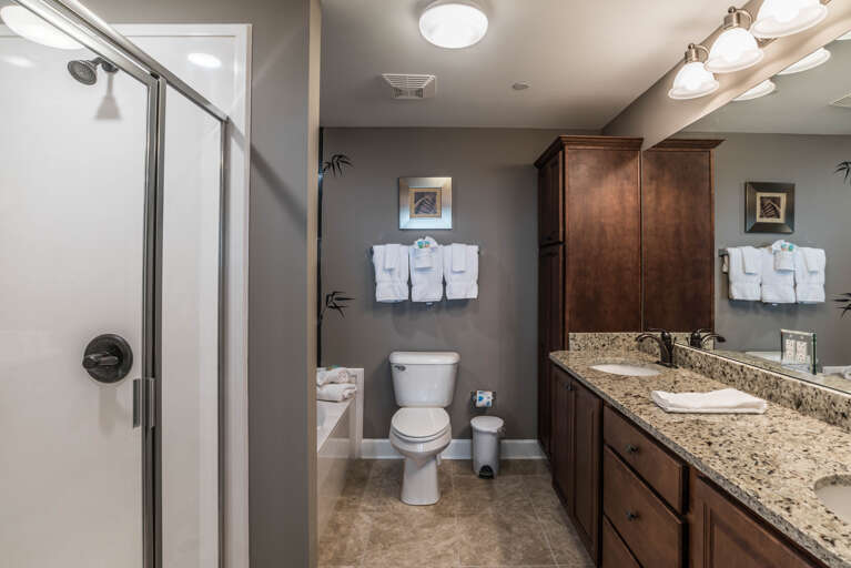 Phoenix Gulf Shores 1403 Master Bathroom with His & Her Sinks, Jetted Tub and Walk-in Shower Phoenix Gulf Shores 1403 Master Bathroom with His & Her Sinks, Jetted Tub and Walk-in Shower