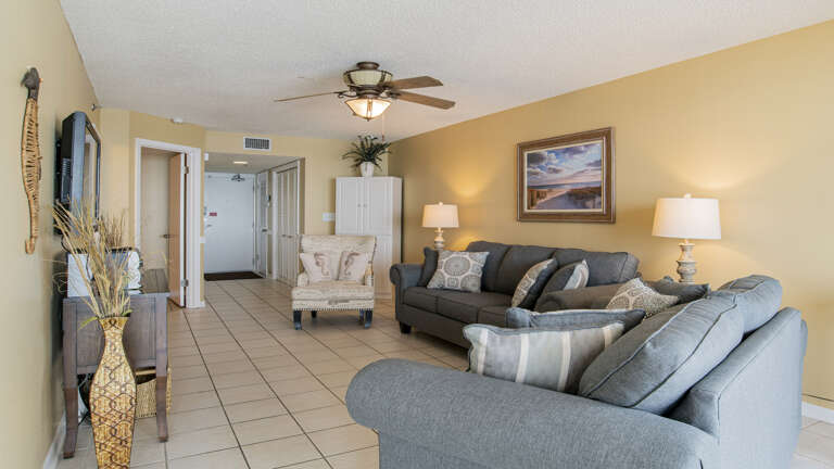Living Room With Sofa And Decorative Items