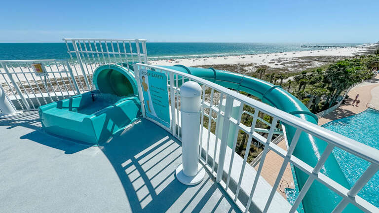 Beachfront Balcony View With Waterslide And Pool