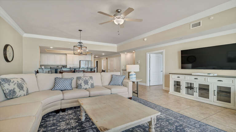 Vacation Rental Living Room With Sectional Sofa And TV