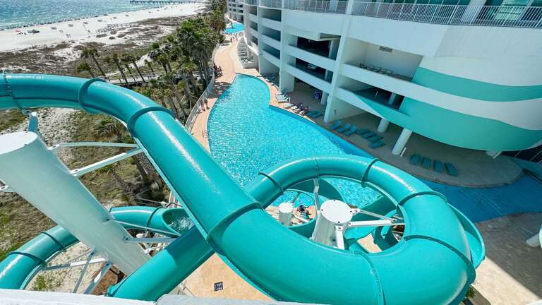 Seaside Building With Water Slides And Pool