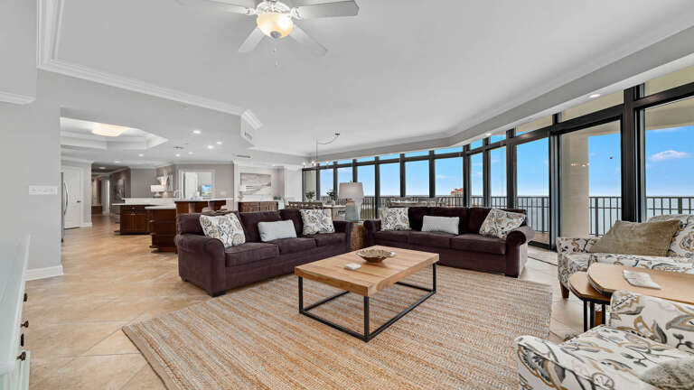 Living Room With Sofas, Coffee Table, And Ocean View
