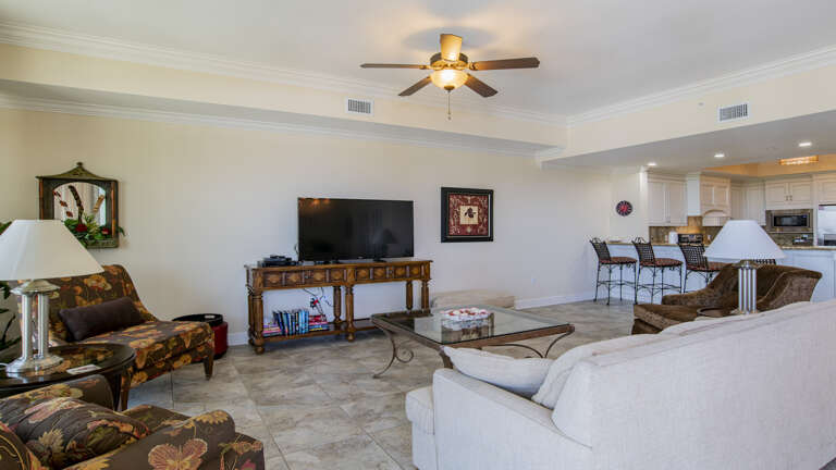 Living Room Interior Of Vacation Rental With Furnishings And TV