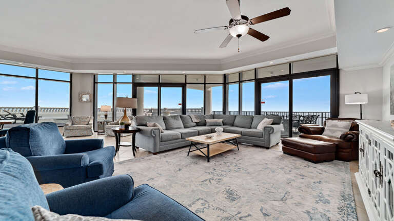 Spacious Living Room With Large Windows And Ocean View