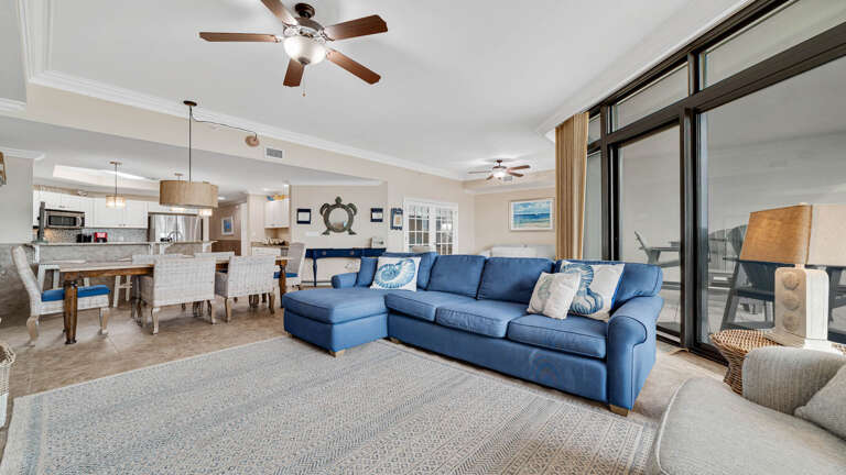 Interior Living Space With Blue Sofa And Open-plan Layout