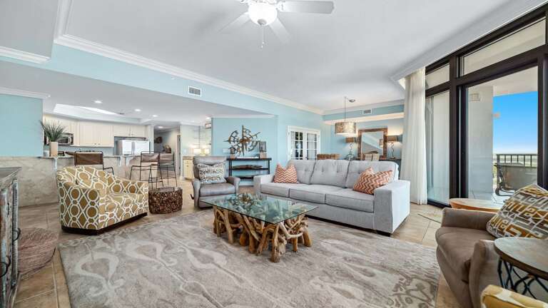 Spacious Living Area With Sofas, Sea-view Balcony Doors