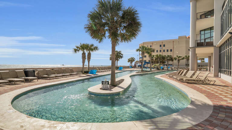 Beachside Pool Area With Palm Tree