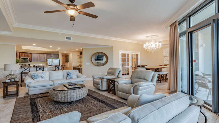 Spacious Living Room Interior With Furnishings And Balcony Access Spacious Living Room Interior With Furnishings And Balcony Access