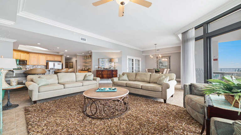 Spacious Living Room Interior With Sofas And Ceiling Fan