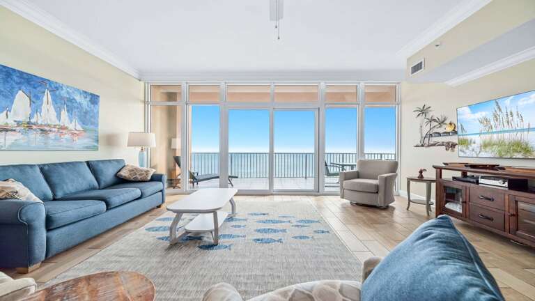 Bright Beachside Living Room With Vast View Of Vivid Blue Sea