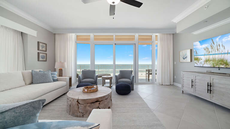 Beachfront Living Room Interior With Balcony And Sea View