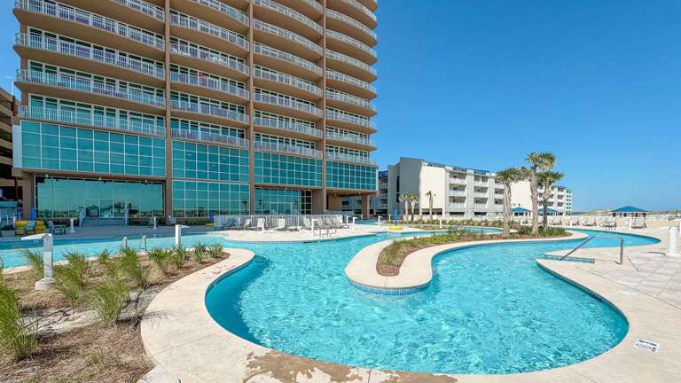 Swimming Pool In Front Of High-rise Building Under Clear Sky