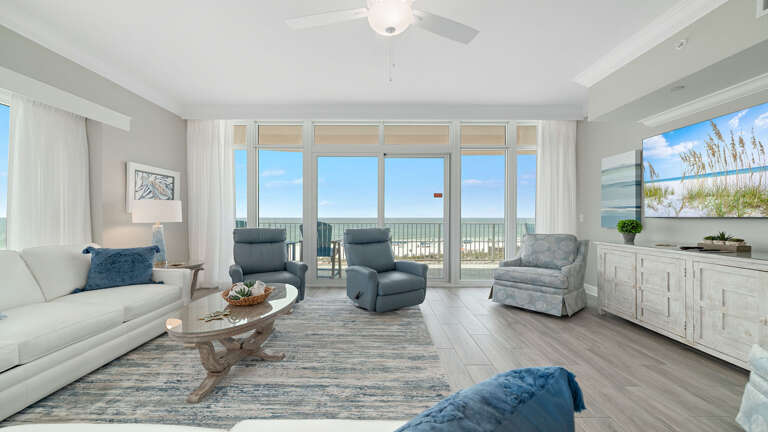 Beachside Living Space With Expansive Ocean View Through Large Windows