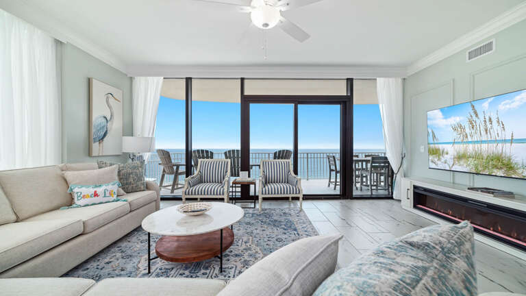 Seaside Living Room Leading To Balcony Views