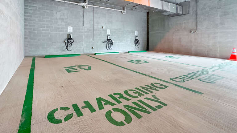 Electric Vehicle Charging Area With Wall-mounted Chargers