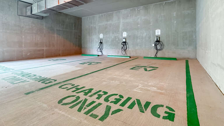 EV Charging Stations In A Concrete Garage