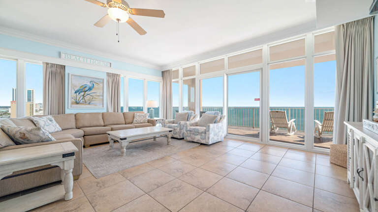 Spacious Sunlit Living Room With Sea View And Seating