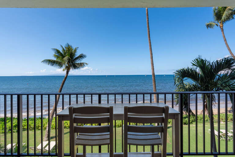 Balcony View Of Beach With Palm Trees And Chairs, Serene Sea Sight