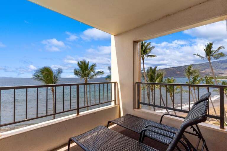 Balcony View Of Blue Bay And Breezy Palms