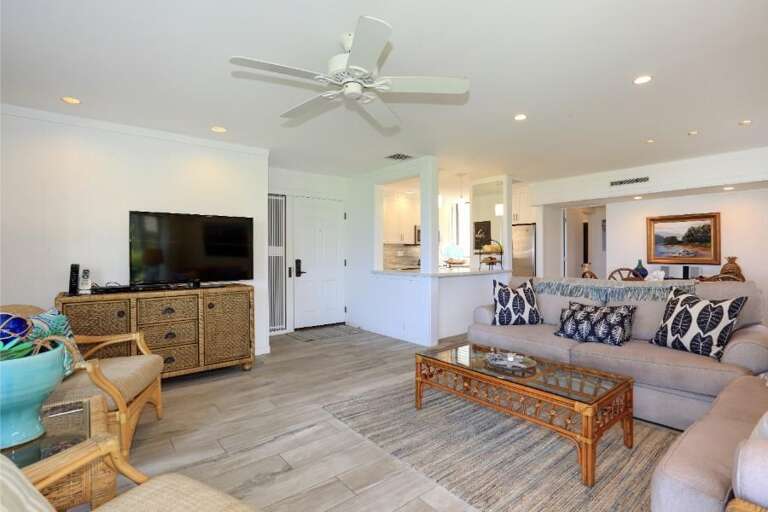 Bright Room With Beige Walls, Bamboo Furniture, Ceiling Fan Above