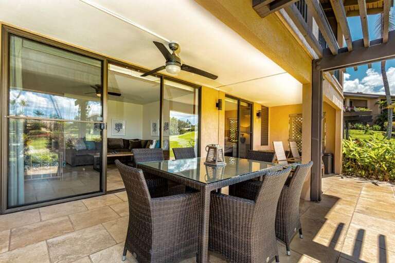 Sunlit Patio With Sliding Doors And Dining Set