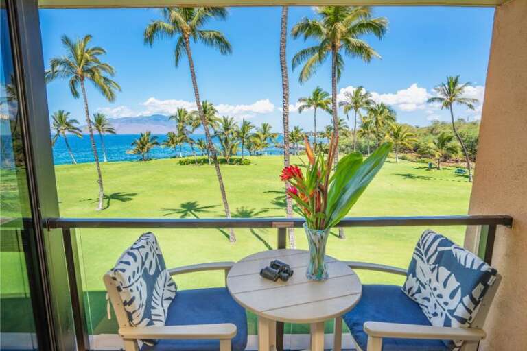 Balcony View With Beach And Palms From Vacation Rental