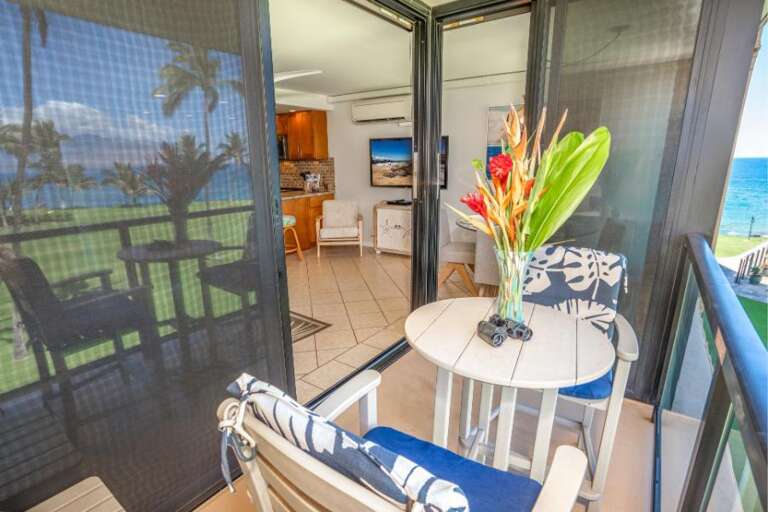 Balcony View Of Beach, Bright Interior, Tropical Flowers, Sliding Glass Doors