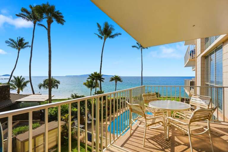 Balcony View Of Blue Ocean, Palm Silhouettes, Gentle Skies