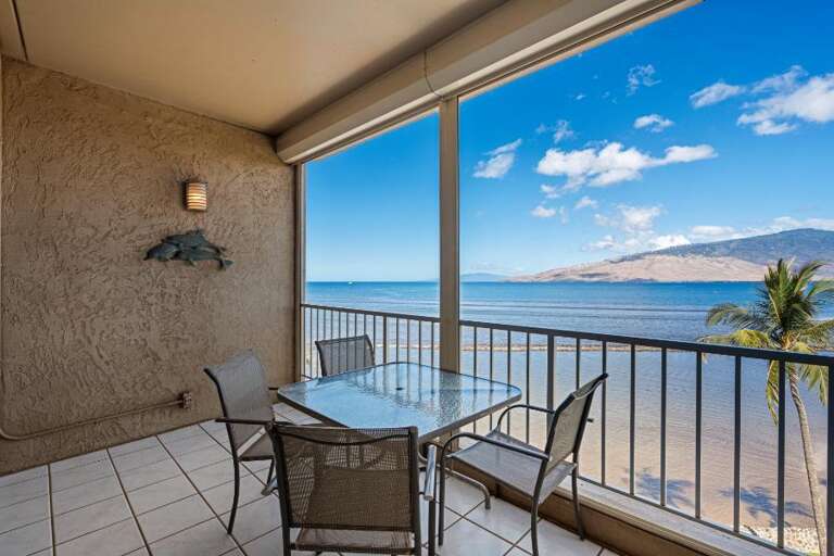Balcony View Of Blue Bay, Bistro Table Beside The Beach
