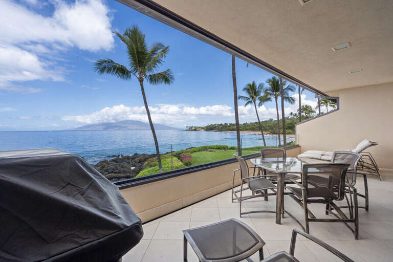 Balcony Beside Blue Bay, Chairs Facing Palms And Ocean View
