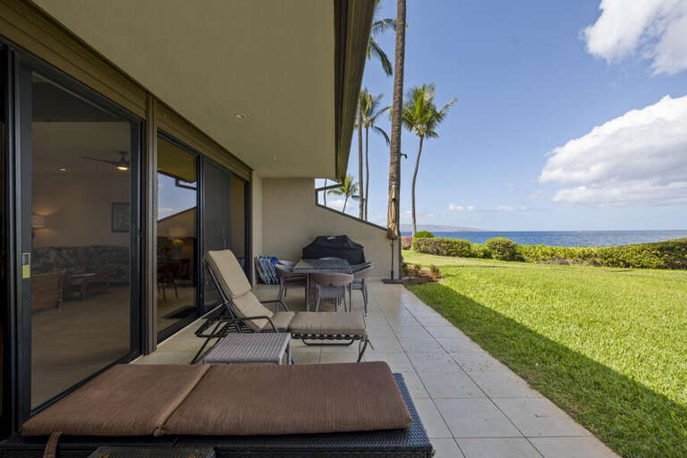 Seaside Stay With Sunlit Patio, Palms, And Peaceful Panorama