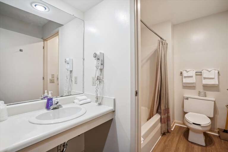 Full bathroom, with tub and shower combo