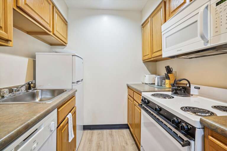 Cook your meals in this efficient kitchen.