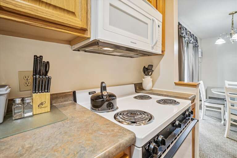 Cook your meals in this efficient kitchen.