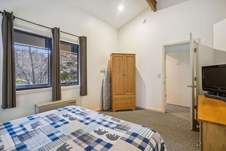 This bedroom has a lot of natural lighting. This bedroom has a lot of natural lighting.