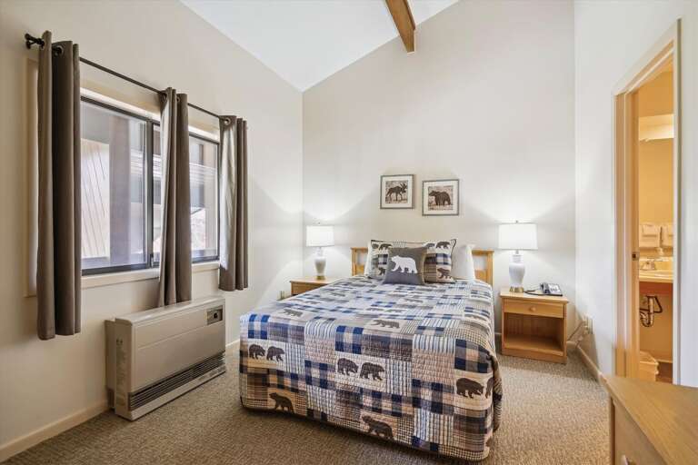 This bedroom has a lot of natural lighting.