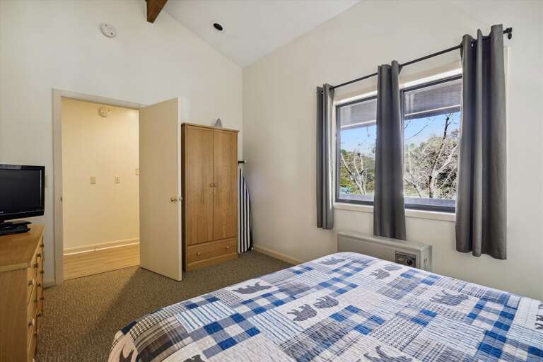 Get a good nights sleep in the bedroom with a queen sized bed.