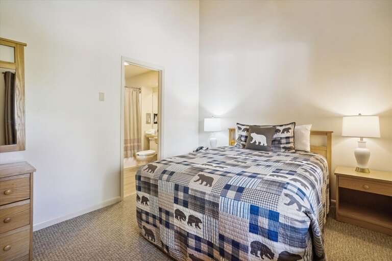 Queen bedroom with attached bathroom.