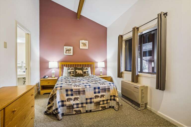 Get a good nights sleep in the bedroom with a queen sized bed.