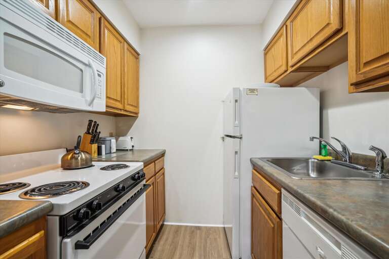 If you prefer to eat in, enjoy the full sized kitchen with all the essentials. If you prefer to eat in, enjoy the full sized kitchen with all the essentials.