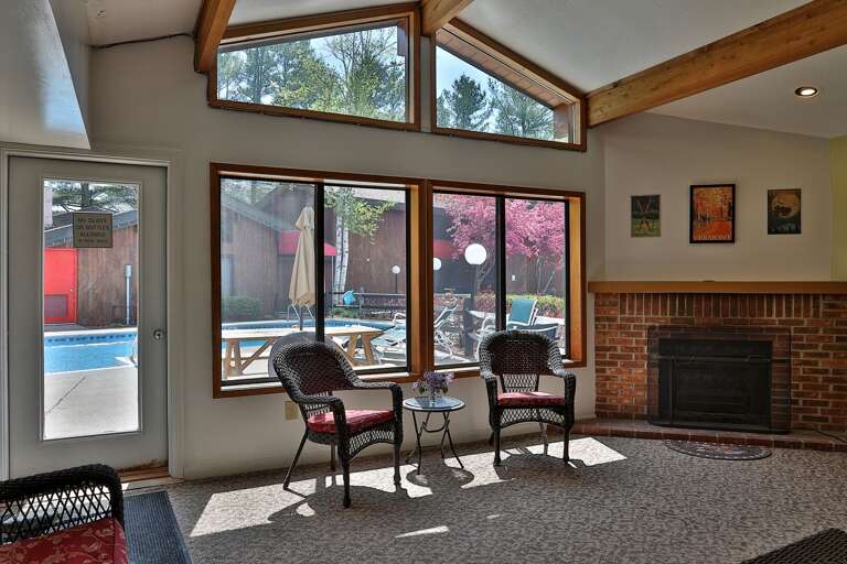 Indoor lounge by the pool.  Heated in winter for your enjoyment!