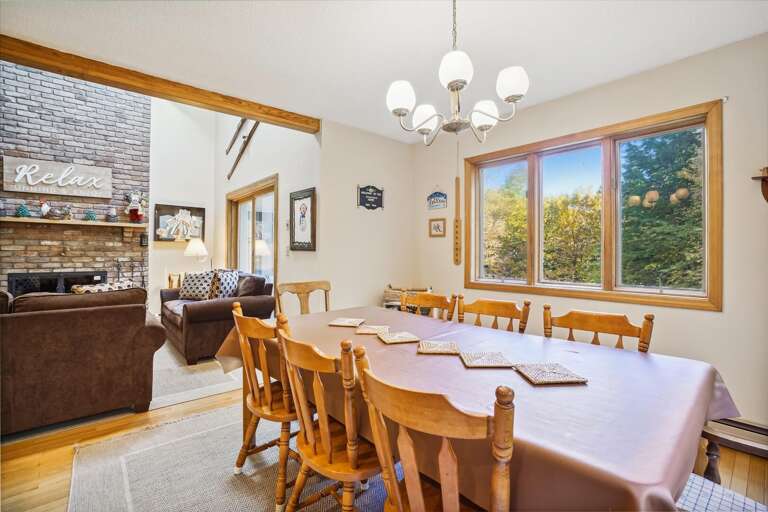 Dining table seats 8 comfortably.  Easy access to the living room.